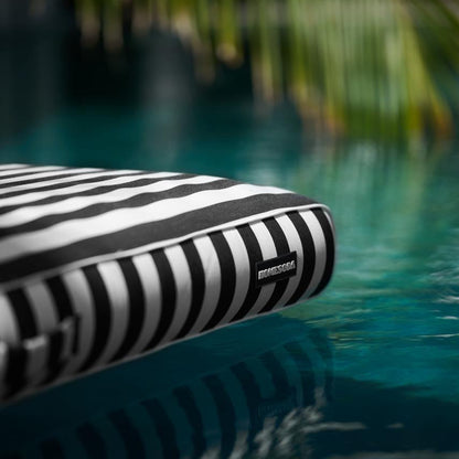 Double Lilo monochrome inflatable pool float with two seats, featuring a modern black and white design for relaxing in the water.