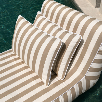 Taupe outdoor cushion set with two 60-inch square cushions from homesoda.store, featuring plush fabric and decorative stitching.