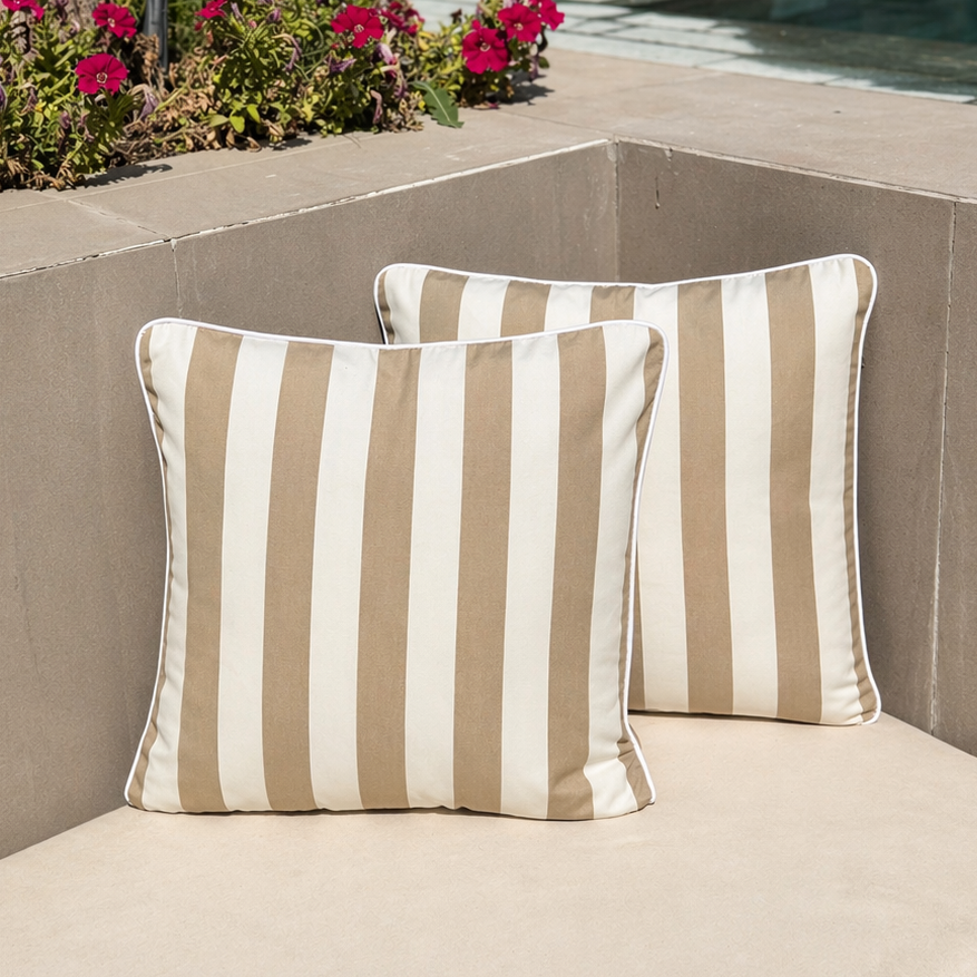 Set of two taupe outdoor cushions from homesoda.store, featuring plush fabric and comfortable design for outdoor seating.