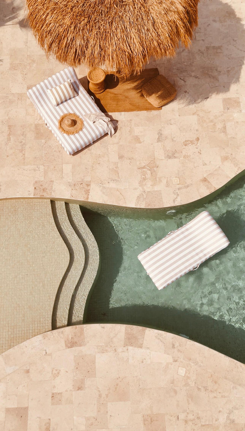 Taupe stripe single and double lilo shown in pool