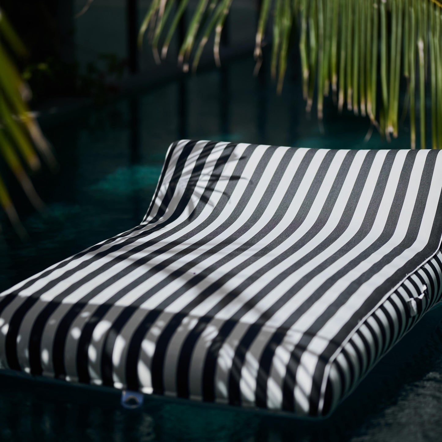 Double Lilo monochrome pool float from homesoda.store, featuring a comfortable, stylish inflatable lounge for pool relaxation.
